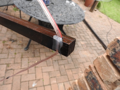 11 m Band Cobwebb antenna centred at 27.500 MHz: Speaker cable kept in place using Marine silicone sealer on each spreader